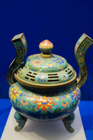 enamel-inlaid Bagua elephant foot furnace from Qing Dynasty at Kaifeng Museum, Kaifeng City, Henan Province, China.のeditorial素材