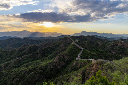 China, Chengde City, Hebei Province, Luanping County, Jinshanling Great Wall Scenic Area, Great Wall Sunsetの写真素材