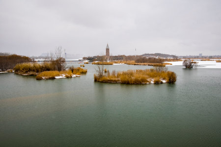Lake and church in winter, Hebei Province, China.の写真素材