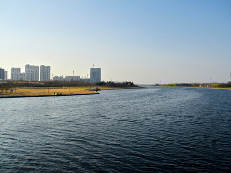 Landscape view of the river and the city on the horizon.の写真素材