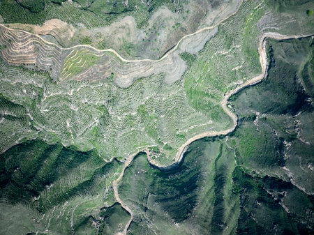 Aerial view of agricultural land in the mountains, agricultural fields.の写真素材