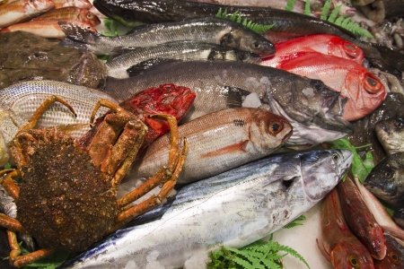 Fresh raw fish at the marketの写真素材