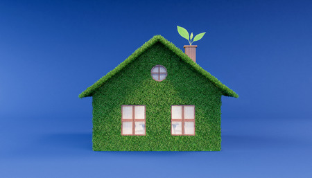 Green eco house on blue background 3D Renderingの写真素材