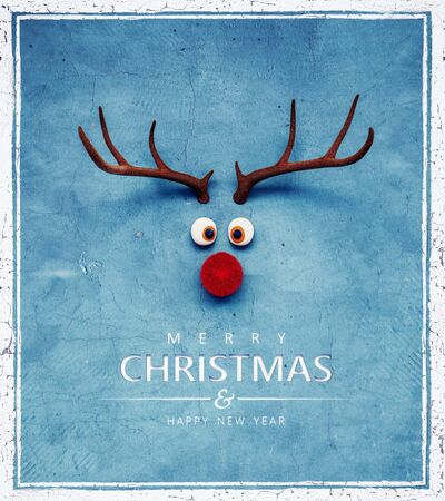 Christmas Reindeer with red cold nose on blue background 3D Renderingの写真素材