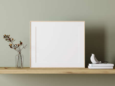 Empty white mock up picture frame on wooden shelf with green plant decoration 3D Rendering, 3D Illustrationの写真素材