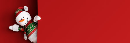 Christmas greeting card with a snowman on a red background. Copy space.の写真素材