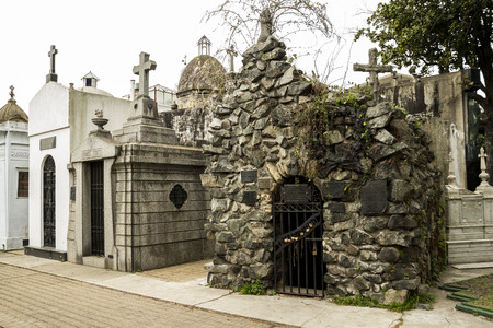 internal streets of Recoleta Cemetery in Buenos Aires. On the sides of the path we see the vaults where are the dead.のeditorial素材