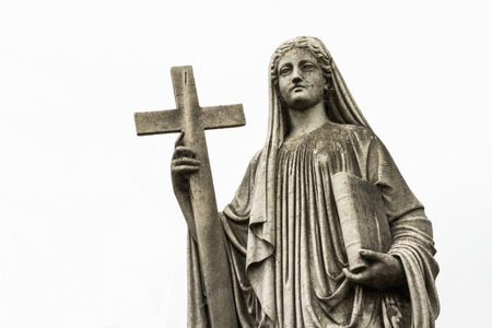 Christian woman statue in the cemeteryの写真素材