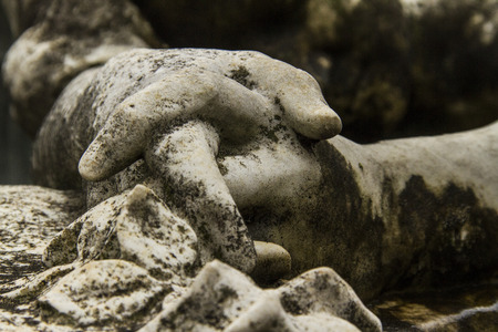 sculpture of crossed hands of marbleの写真素材