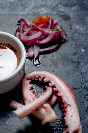 Peruvian Ceviche served in a signature cuisine. The separate ingredients highlighting each of them.