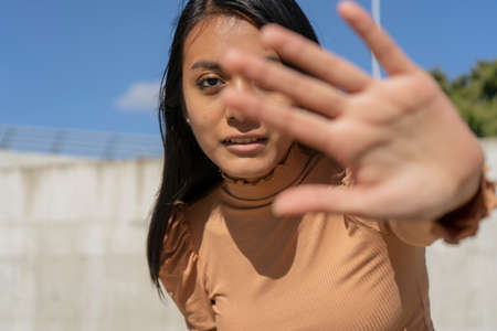 Attractive business woman showing palm of the handの写真素材