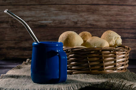 Cheese bread called chipa whit Mate tea cup and yerba mate dried leavesの写真素材
