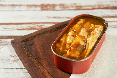 Can of sardines in tomato sauce on a table. High viewの写真素材