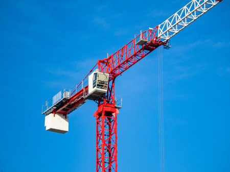 Construction crane at the construction site of a large building.の写真素材