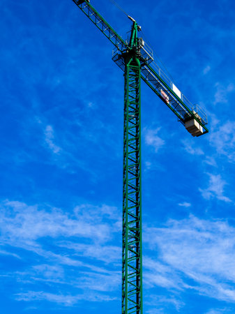 Construction crane at the construction site of a large building.の写真素材