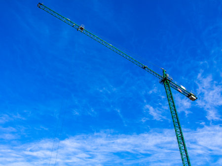 Construction crane at the construction site of a large building.の写真素材