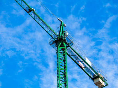 Construction crane at the construction site of a large building.の写真素材