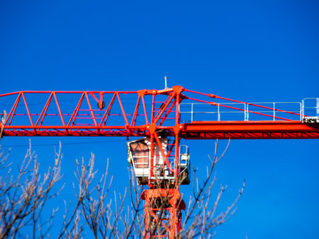 Construction crane at the construction site of a large building.の写真素材