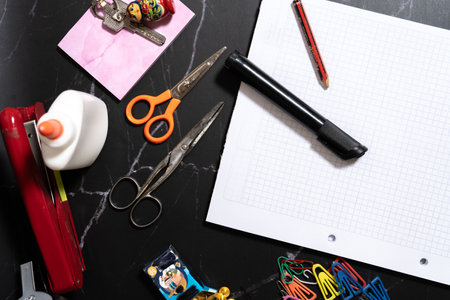 Messy set of office or school stationery items. Office supplies. Aerial view