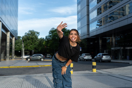Young woman expressing joy in urban setting