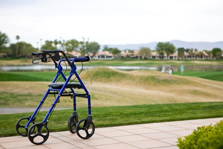 Walker Outdoors on Patio With Golf Course In Backgroundの写真素材