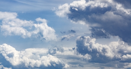 Blue sky background with clouds, aerial view, cloudscape