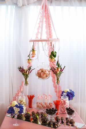 Stylish sweet candy bar set at the wedding ceremony, confectioneryの写真素材