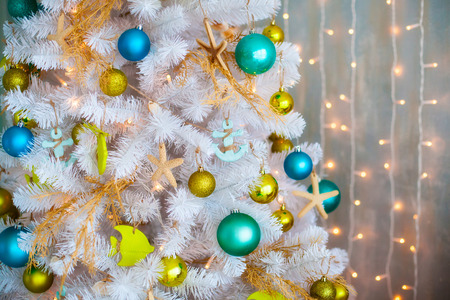 White decorative x-mas tree with colourful balls, christmas conceptの写真素材