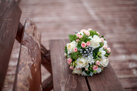 Beautiful wedding bouquet on wooden background. Marriage conceptの写真素材