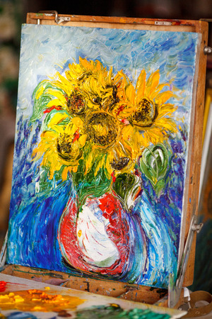 Fresh picture oil painting on canvas in studio. Vertical. Sunflowers.の写真素材