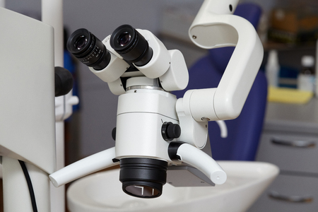 Professional medical dental binocular microscope in the dentist's officeの写真素材