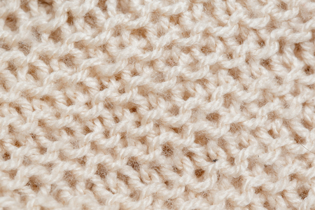 Macro texture of knitted blanket. Abstract textile background. Extremely closeupの写真素材