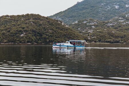 Rijeka crnojevica, montenegro - september 11, 2019: Touristic passenger boat on excursion to Lake Skadar National Park in Montenegroのeditorial素材