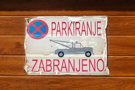 Petrovac, montenegro - september 12, 2019: No parking sign near gate of garage, warns drivers that their car will be towedのeditorial素材