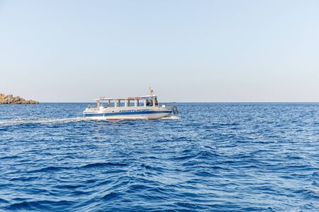 Petrovac, montenegro - september 14, 2019: Touristic boat on Mediterranean Sea excursionのeditorial素材