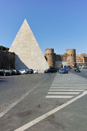 ROME, ITALY - JUNE 22, 2017: Amazing view of Pyramid of Caius Cestius and Porta St. Paolo in city of Rome, Italyのeditorial素材