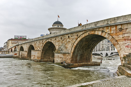 SKOPJE, REPUBLIC OF MACEDONIA - FEBRUARY 24, 2018:  Skopje City Center, Old Stone Bridge and Vardar River, Republic of Macedoniaのeditorial素材