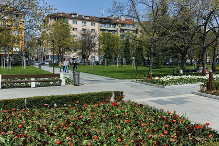 SOFIA, BULGARIA -APRIL 14, 2018:  Flowers in the park in front of  National Palace of Culture in...