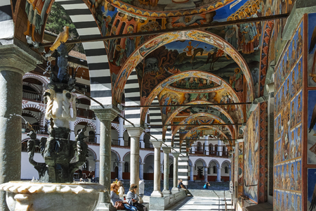 RILA MONASTERY, BULGARIA - APRIL 21, 2018: Tourist visiting Monastery of Saint Ivan (John) of Rila...