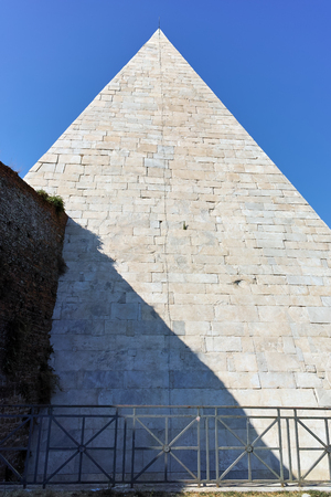 ROME, ITALY - JUNE 22, 2017: Amazing view of Pyramid of Caius Cestius and Porta St. Paolo in city of Rome, Italyのeditorial素材