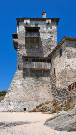 Medieval tower at the beach of town of Ouranopoli, Athos, Chalkidiki, Central Macedonia, Greeceの写真素材