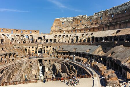 ROME, ITALY - JUNE 24, 2017: Tourists visiting inside part of  Colosseum in city of Rome, Italyのeditorial素材