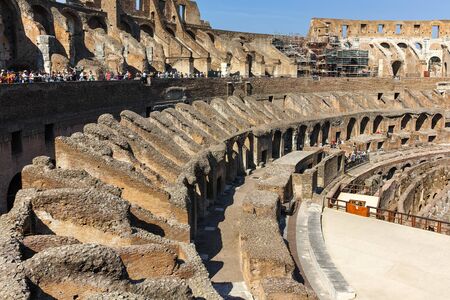 ROME, ITALY - JUNE 24, 2017: Tourists visiting inside part of  Colosseum in city of Rome, Italyのeditorial素材