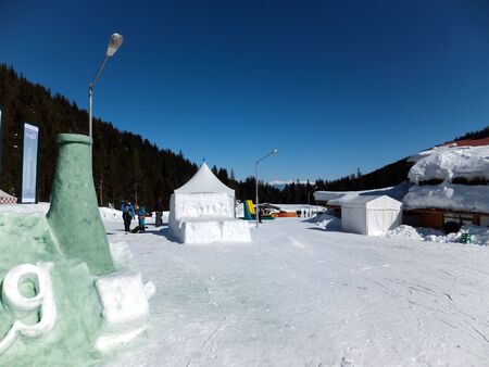 BANSKO, BULGARIA - FEBRUARY 12, 2012: Winter view of Ski area of Resort of Bansko, Pirin Mountain,...