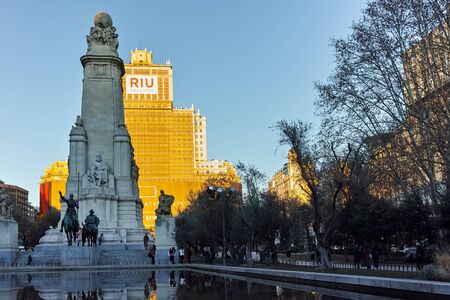 MADRID, SPAIN - JANUARY 21, 2018:  Sunset view of Monument to Cervantes and Don Quixote and Sancho Panza at Spain Square in City of Madrid, Spainのeditorial素材