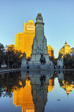 MADRID, SPAIN - JANUARY 21, 2018: Sunset cityscape of Monument to Cervantes and Don Quixote and Sancho Panza at Spain Square in City of Madrid, Spainのeditorial素材