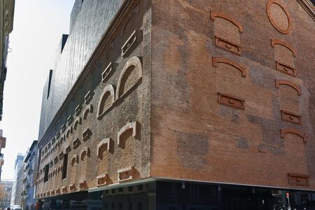 MADRID, SPAIN - JANUARY 22, 2018: Vertical garden wall and CaixaForum Museum in City of Madrid,...