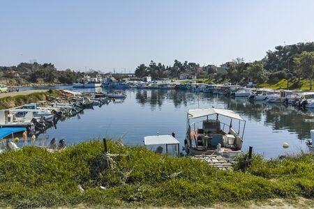 NEA POTEIDAIA, GREECE - MARCH 31, 2019: Port of town of Nea Poteidaia, Kassandra, Chalkidiki, Central Macedonia, Greeceのeditorial素材