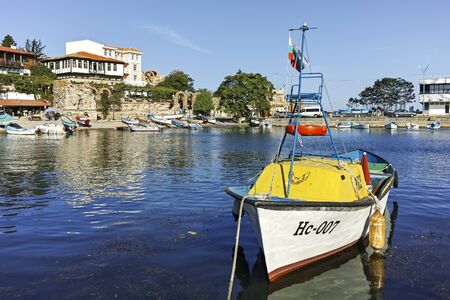 NESSEBAR, BULGARIA - AUGUST 12, 2018: Panoramic view of boat at The Port and old town of Nessebar,...
