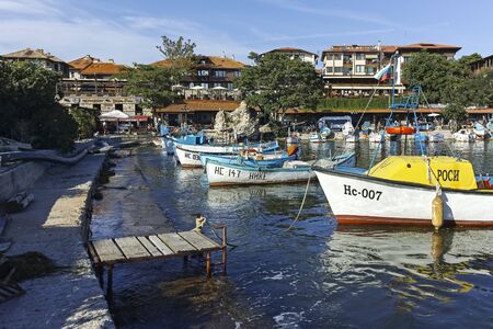 NESSEBAR, BULGARIA - AUGUST 12, 2018: Panoramic view of boat at The Port and old town of Nessebar,...